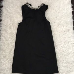 Black dress with gem detail at collar